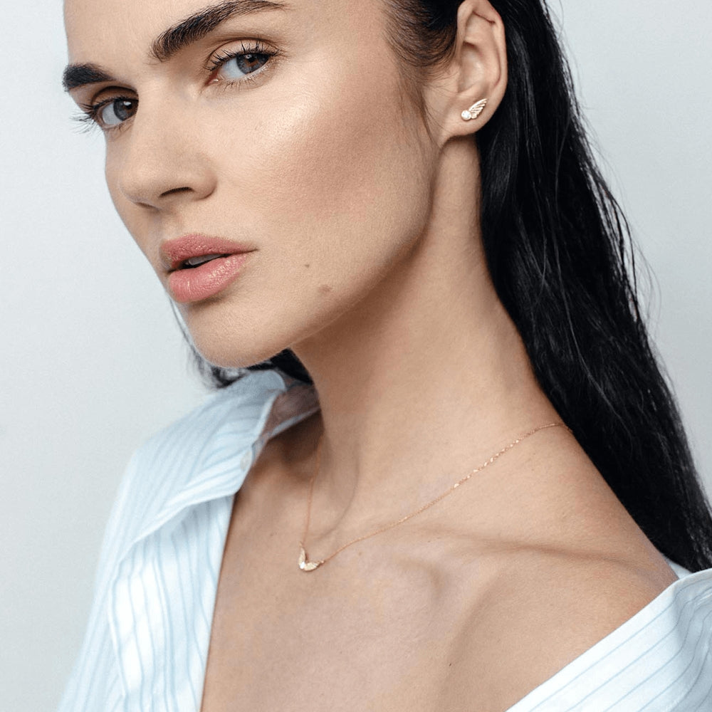 golden wings pendant necklace with lab grown diamond by Formes Justina Jarute