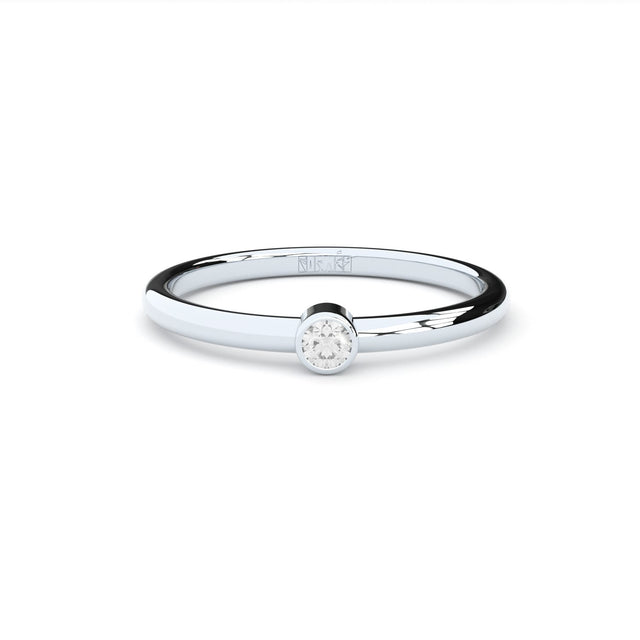 bezel set engagement ring with lab grown diamonds by Formes