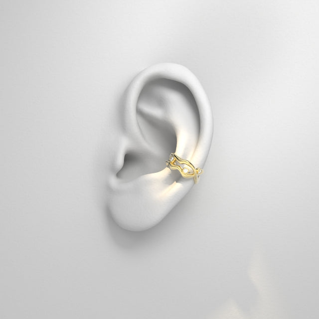 Golden ear cuff from Bare Souls collection of 2 threads and diamonds by Formes