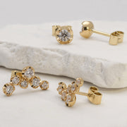 cluster earrings and studs with diamonds