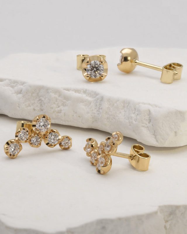 cluster earrings and studs with diamonds