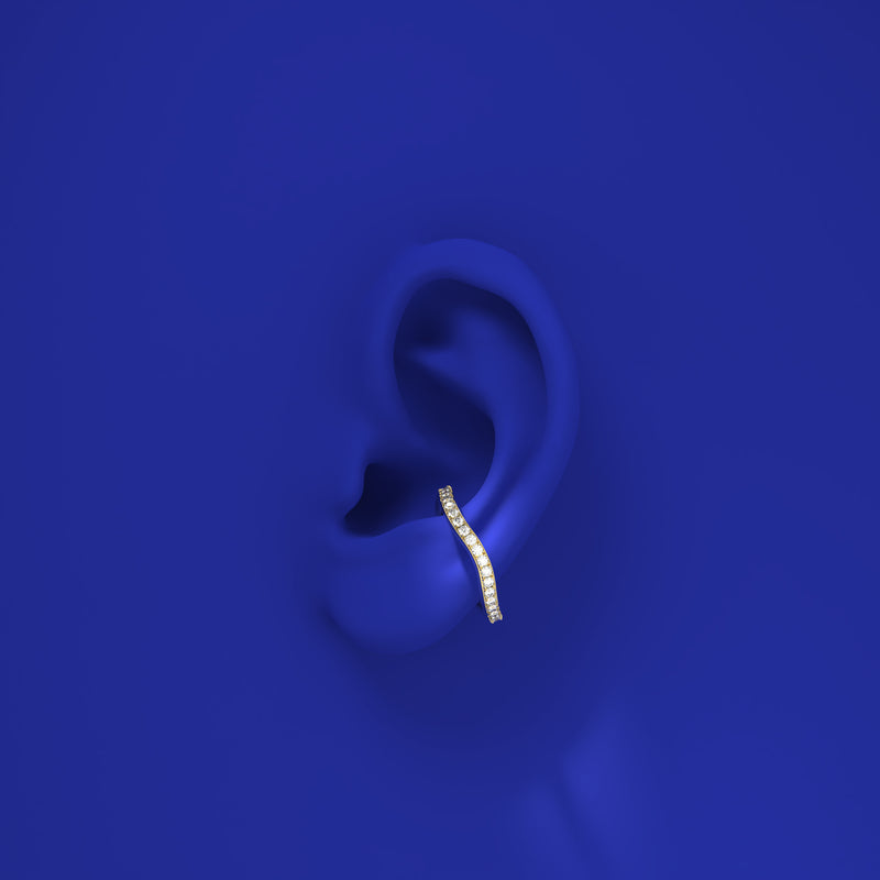 curved ear cuff and ring with diamonds by formes on lower ear