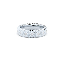 designer wedding ring with conceptual lines and shapes