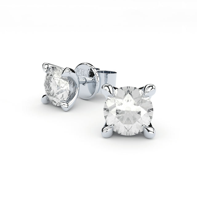  diamonds ear studs by Formes