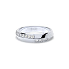 Tiny Clash edgy wedding ring with a distorted diamonds line