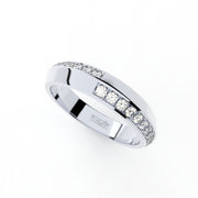 Tiny Clash edgy wedding ring with a distorted diamonds line by Formesjewelry.com