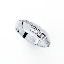 Tiny Clash edgy wedding ring with a distorted diamonds line
