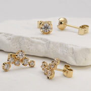yellow gold diamond cluster earrings by Formes