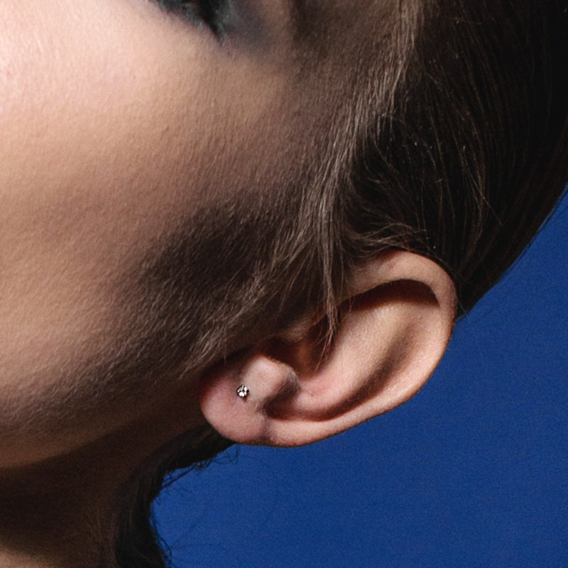 tiny diamond ear studs by Formes
