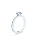 edgy solitaire ring with pave side lab grown diamonds by Formes