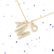 Initial U pendant by Formesjewelry.com
